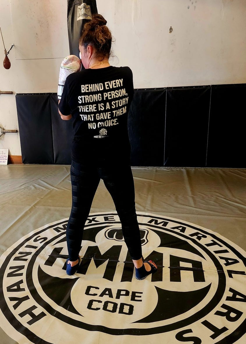 Behind Every Strong Person — Tee - Raise The Standard Apparel