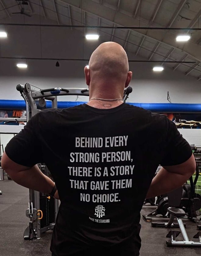 Behind Every Strong Person — Tee - Raise The Standard Apparel
